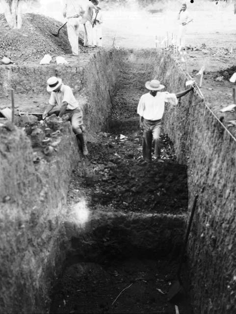 Excavation 2-31. General view of men working in trench