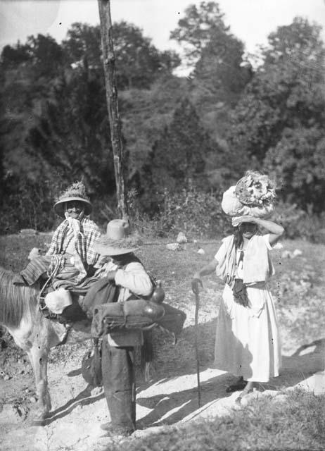 Indigenous Guatemalans traveling on road from Metapan