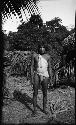 Man standing in jungle