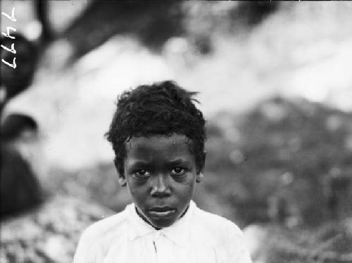 Frontal view of young African mixed race male child