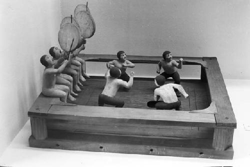 Wooden model showing dance in a sweat bath