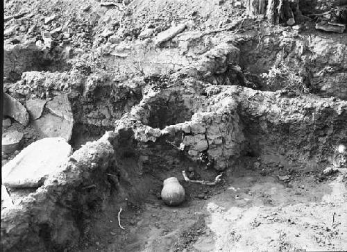 Room 99A, Bin in northwest Corner and Banded Neck Jar Found in the Bin