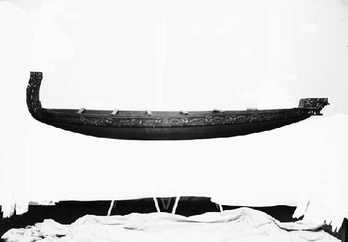 Model of canoe, close-up of prow