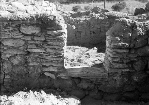 View of excavation site, and shots of artifacts