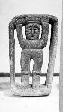 Atlantean figure in keystone-shaped frame