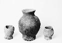 Three clay jars of various sizes