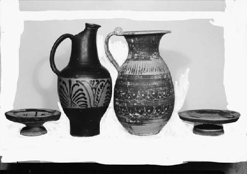 Two Etruscan pottery vases and Two pottery plates