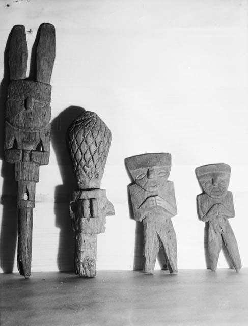 Four wooden figures