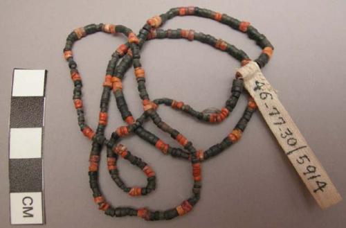 Stone and shell bead necklace (black and red beads)