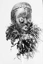 Black wooden mask with feathers as beard, Ka Dei Ke Se
