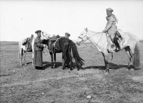Mongolian women, with ponies near Chao Ho