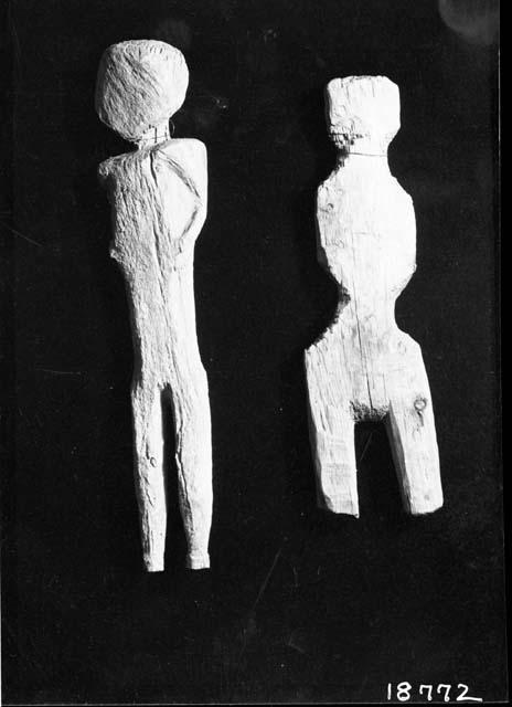 Small wooden human effigies