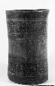 Jar with rows of glyphs