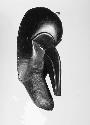 Black wooden mask with bird-like beak, Kpo go