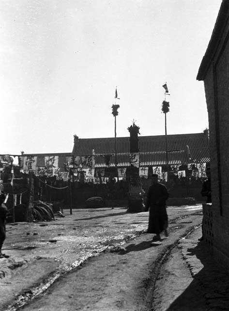 Inn yard decorated with pennants and flags for New Year celebration