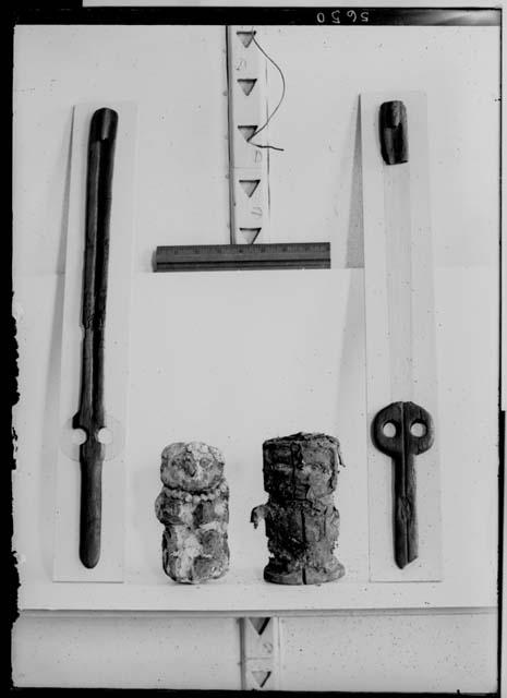 Wooden atlatl, wooden  figures covered with copal