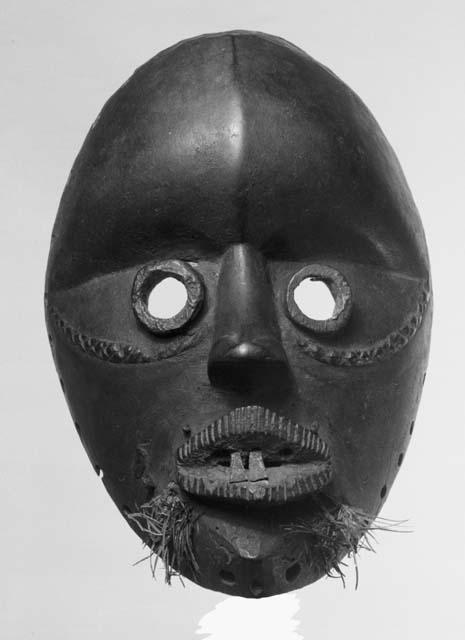 Black wooden mask, messenger for Lo La Glu