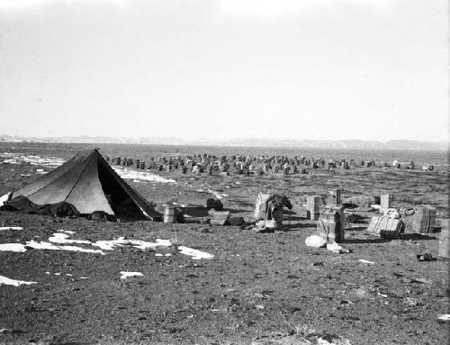 Tent surrounded by supplies