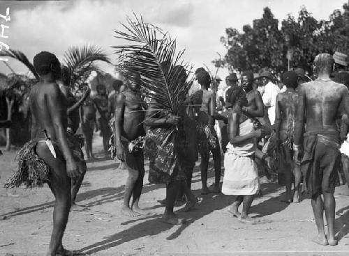 Group involved in funeral dance