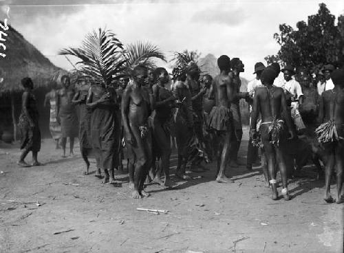 Group involved in funeral dance