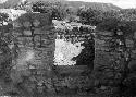 View of excavation site, and shots of artifacts