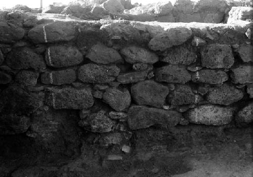 View of excavation site, and shots of artifacts