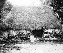 Modern Maya potter scraping the base of a cantaro about 1900