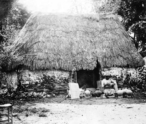 Modern Maya potter scraping the base of a cantaro about 1900