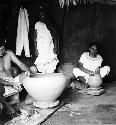 Modern pottery making - resting on a kabal which in turned by the hands or feet