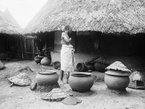 Lye pots in front of house