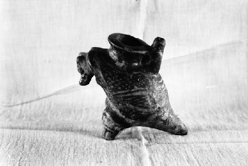 Zoomorphic, decorated effigy jar, side view from excavation 1-31, grave 1E