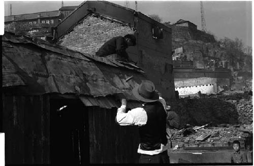 Man working on a roof