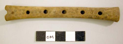 Small bone flute - incised circle design