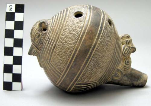 Marbella type ocarina with animal heads and suspension holes