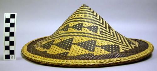 Hat woven of bamboo in abstract line and triangle pattern