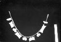 Necklace with carved ivory pendants