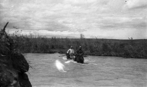 Crossing Tekes, two men on pack horses fording river