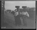 Girls carrying baskets