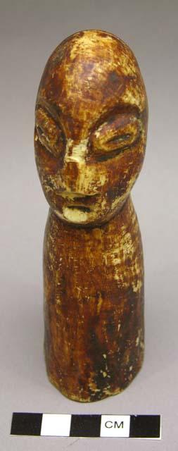 Ivory figure with dark-brown patina