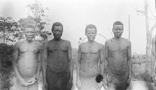 Front view of four men