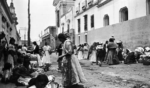 Open air market full of vendors and buyers