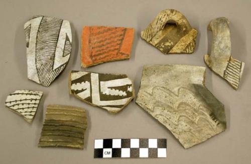 Ceramic, body and rim sherds, some with painted designs, some with lugs