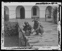 Man and Child on Dock