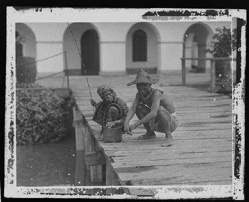 Man and Child on Dock