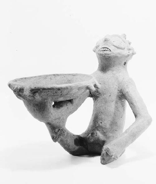 One crude pottery figure