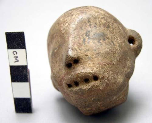 Ceramic whistle, human head