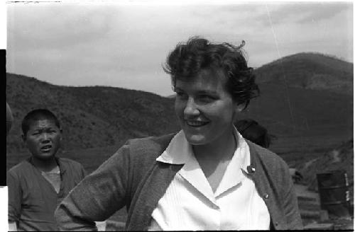 Woman with view of mountains in background