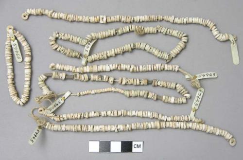 Strings of shell beads