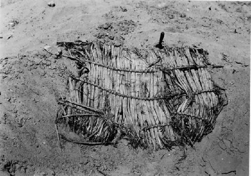 LI-26 Can mat covering burial 9 after excavation