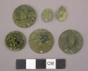 Metal, personal, buttons, round or oval, some with loops in tact, corroded